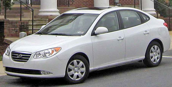The vehicle stolen is a beige 2002 Hyundai Elantra with a Moretti's sign on 