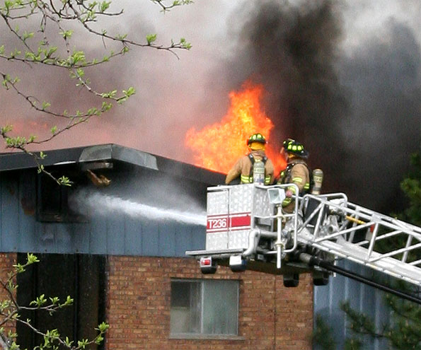 Buffalo Grove Fire Department Tower 25 fire in background