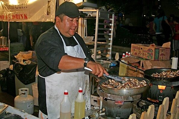 Cooking at Taste of Arlington Heights near Harmony Park, August 2012