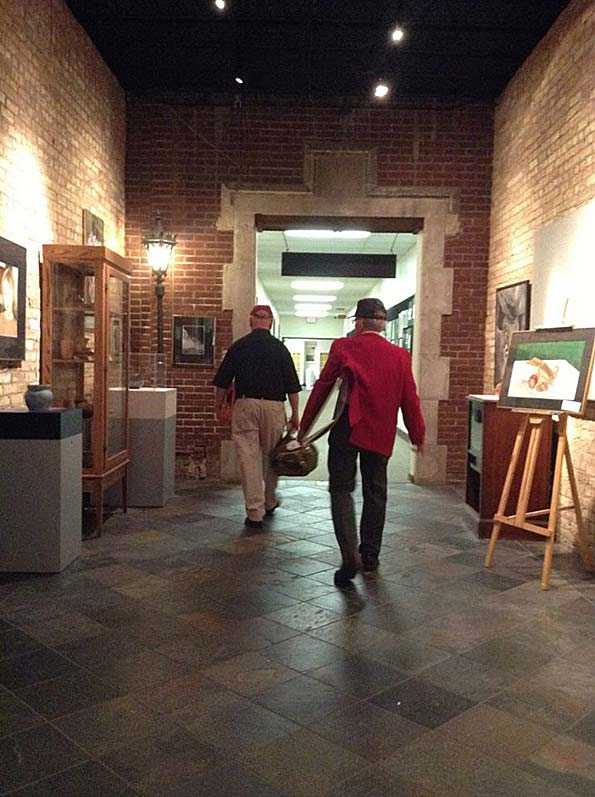 Russ Attis and Bob Frisk leaving the former Arlington High School's while walking in the school's east hallway