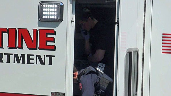 Shooting victim with paramedics in Palatine Fire Ambulance