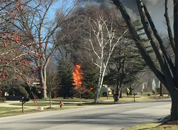 Garage Fire extending to house fire Arlington Heights