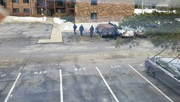 Jeep with tarp after vehicle fire at Cinnamon Cove Condos