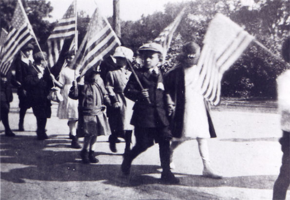 Children with US flags Children with US flags