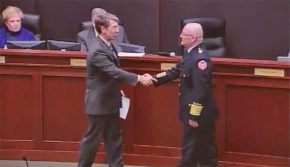 Mayor Tom Hayes with Arlington Heights Fire Chief Andrew Larson Swearing In