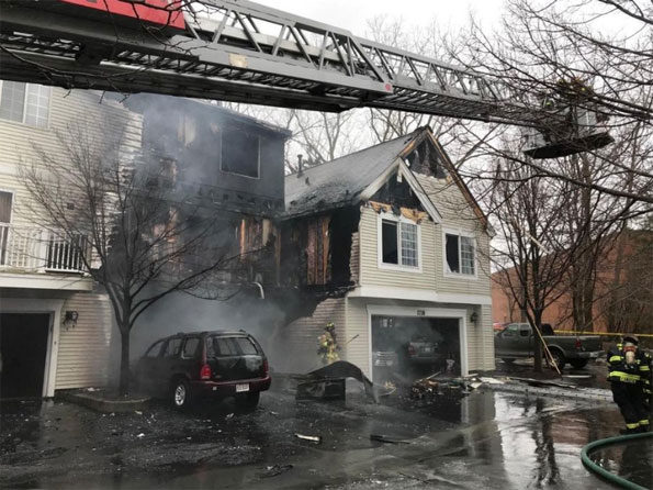 Wheeling townhouse fire caused by car fire