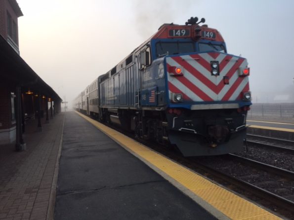 Foggy Metra train departing