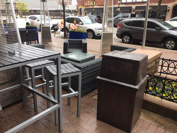 Garbage can outdoor dining at Shakou