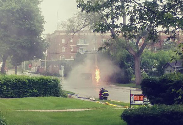 Gas-fed flame rising from ground