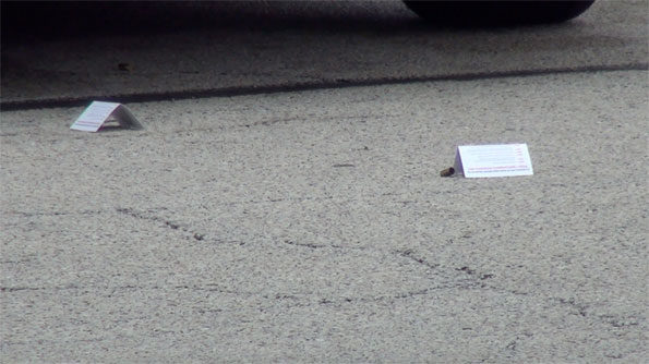 Shell casings and markers at Rolling Meadows Walmart shooting scene