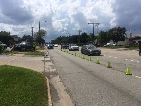 Buffalo Grove police quickly opened a lane in each direction on Dundee Road after a crash involving a utility pole