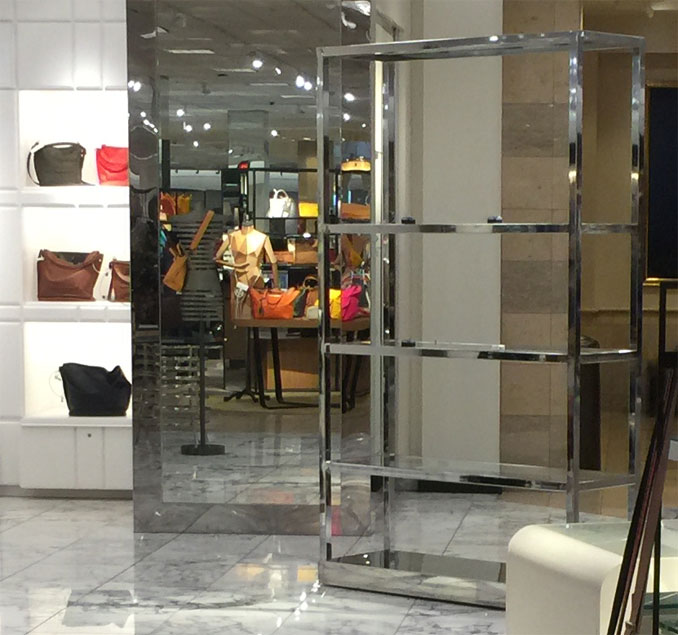 Handbag rack Nordstrom Woodfield where thousands of dollars in handbags taken in Flash Mob Robbery