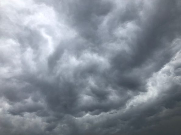 Turbulent clouds after lightning strike at townhouse with no fire in Arlington Heights