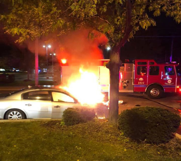 Car vs pole fire with police rescue in Zion