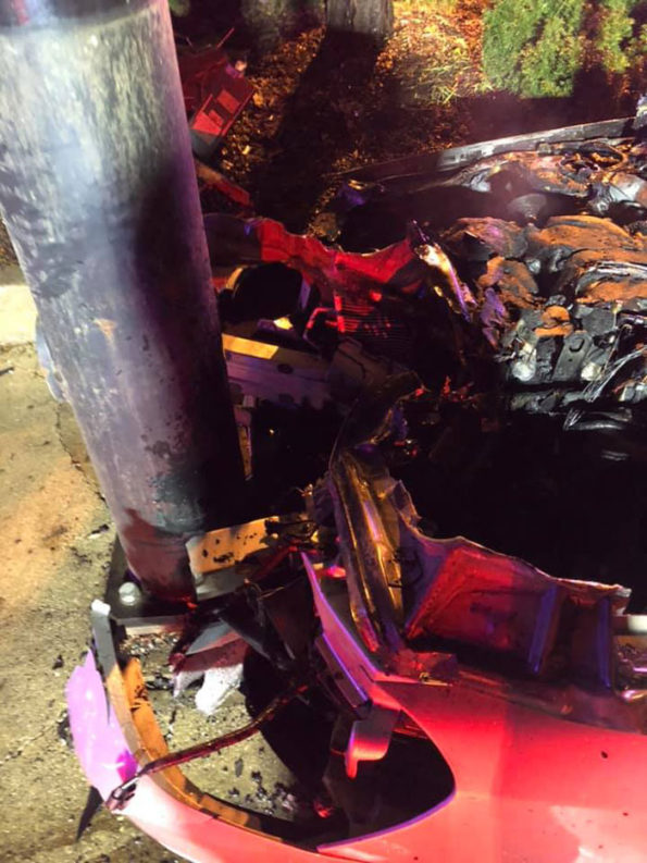 Car vs pole crash damage involved with police rescue in Zion