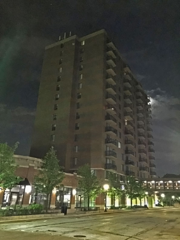 Dunton Tower with Moon in background in June 2018.