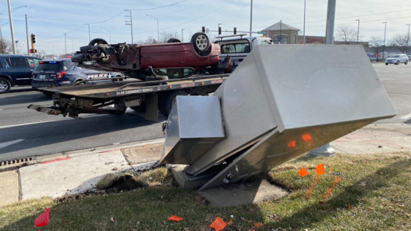 Traffic control box hit in crash in Arlington Heights