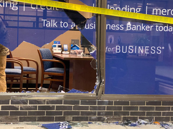 Clean up after vehicle crash into Chase bank window in Arlington Heights