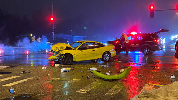 The yellow Chevrolet Cavalier after a head-on crash at Arlington Heights Road and Hintz Road