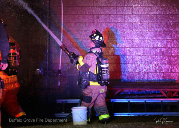 Firefighter with handline at Dengeos restaurant fire (SOURCE: BGFD/J Kleeman)