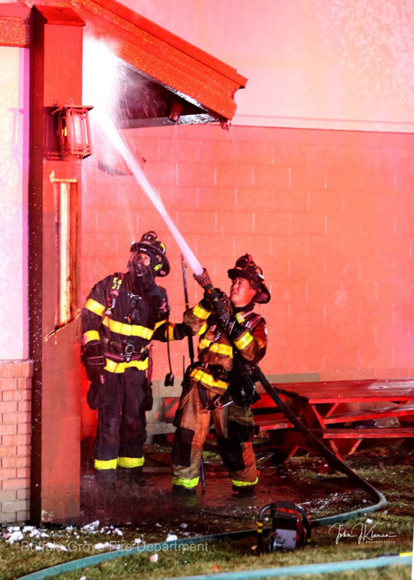 Handline attack at soffit at Dengeos fire Sunday January 5, 2010 (SOURCE: BGFD/J Kleeman)