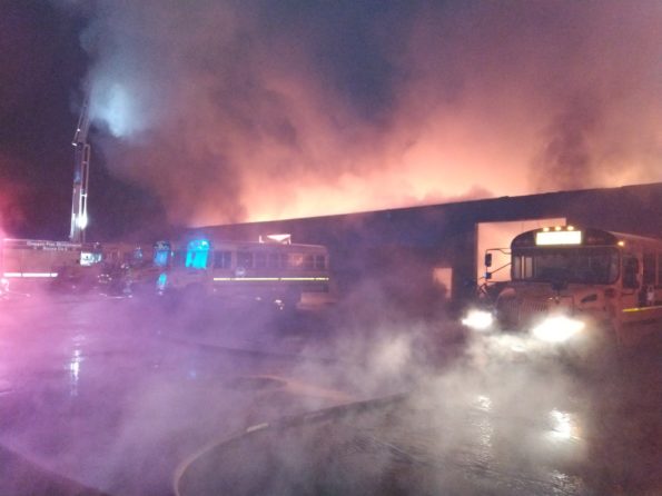 School buses exposed near vacant warehouse fire on Vincennes near 85th Street Chicago (SOURCE: CFD Media)