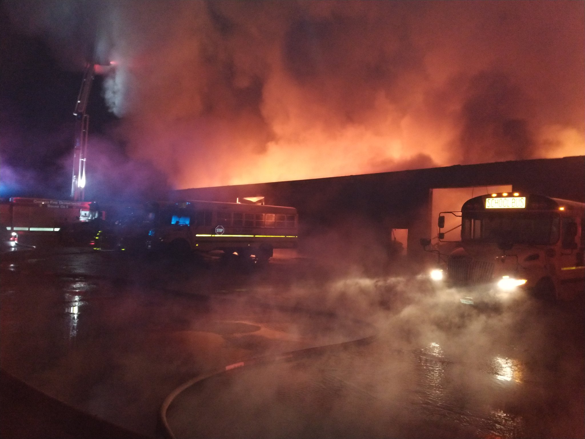 School buses exposed near vacant warehouse fire on Vincennes near 85th Street Chicago (SOURCE: CFD Media)