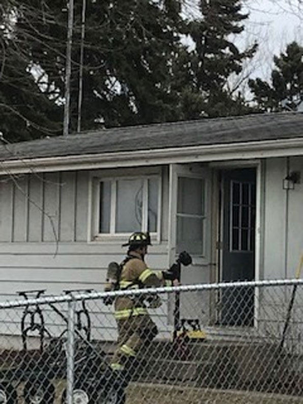 Firefighter entering house fire scene on Main Street, Antioch Thursday March 5, 2020 (SOURCE: Antioch Fire Department)