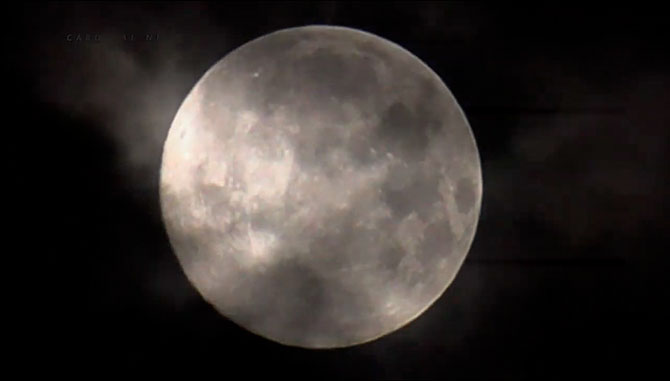 Full Moon with clouds arriving over Arlington Heights, Illinois March 9, 2020 about 5:00 a.m.