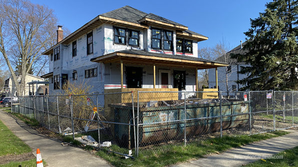 Illegal dumping at residential construction site dumpster