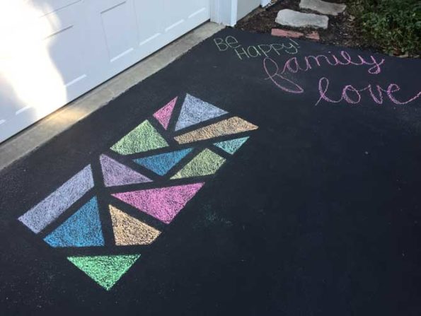 Chalked Stained Glass art on driveway in Arlington Heights