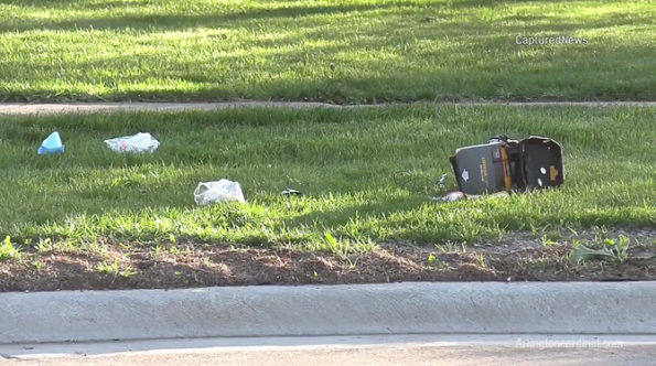 Defibrillator and used medical supplies at scene where gunshot victim was treated