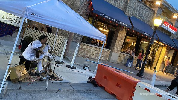 Outdoor entertainment in front of Hey Nonny  on Vail Avenue, Arlington Heights