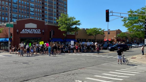 Police reacted when protesters strayed slightly into motorists at Arlington Heights Road and Sigwalt Street, but no encounters occurred