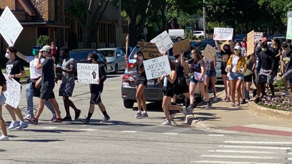 Protesters step off for the march at North School at Eastman Street and Evergreen Avenue in Arlington Heights, Illinois
