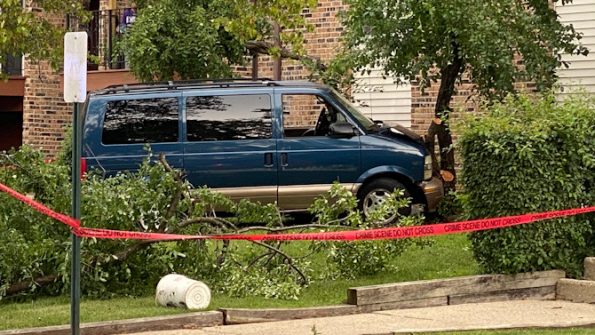 A man was hit by this minivan and trapped under it for several minutes Saturday afternoon in Hoffman Estates