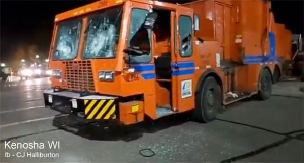 Garbage truck with broken windshield just before it was set on fire (SOURCE: CJ Halliburton)