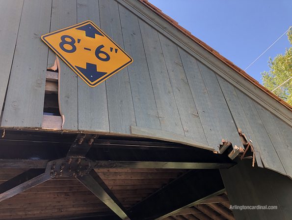 Damage to wood planks on the covered bridge in Long Grove