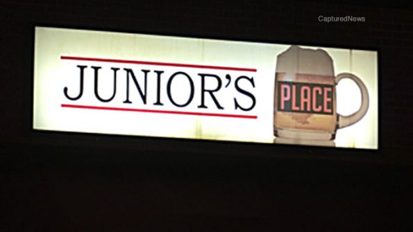 Junior's Place sign; Cook County Sheriff's Office deputies and investigators on scene at Junior's Place bar in strip mall on Grand Avenue near Wolf Road