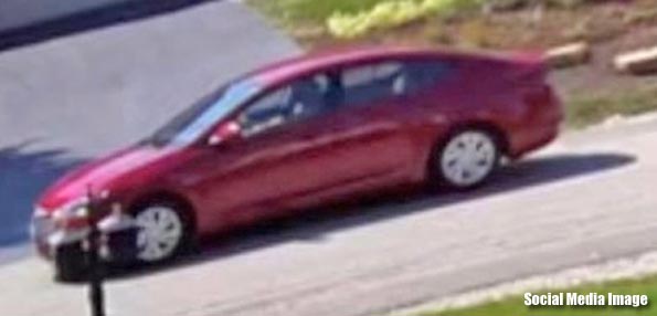 Shared on social media: Red car belonging to indecent exposure suspect (lightened image)