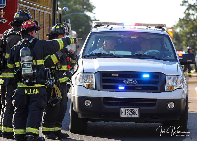 Updating fire command face-to-face at strip mall fire in Mundelein Wednesday, September 2, 2020 (PHOTO CREDIT: J. Kleeman)