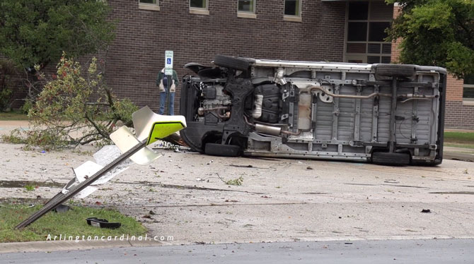 Rollover delivery van crash into Indian Grove Elementary School parking lot in Mount Prospect