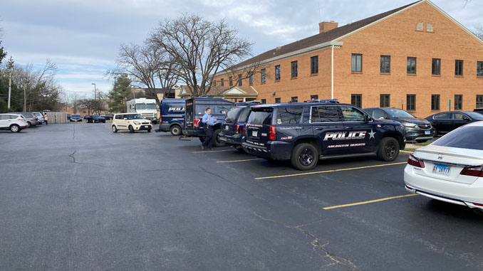 Arlington Heights police personnel out helping at Food and Toy Drive at Wheeling Township