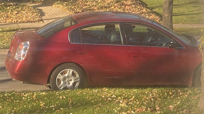 Suspicious red sedan on Tuesday, November 3, 2020 not the same as image captured from indecent exposure case in August 2020