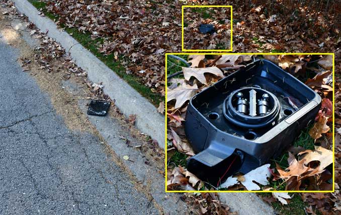 Black side mirror evidence from fatal hit-and-run pickup truck crash in Lake Forest on Mayflower Road