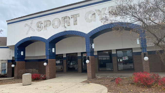 Xsport Fitness sign removed at 320 East Golf Road in Arlington Heights