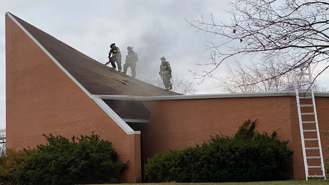 Firefighters working to extinguish a fire at the Christian Church of Arlington Heights at 333 West Thomas St. at the corner of Thomas Street and Chestnut Avenue.