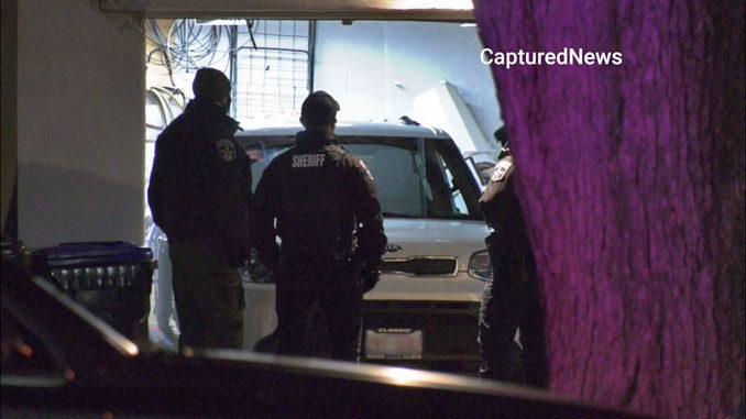 Crime Scene in garage, two shooting deaths on Wadsworth Road in Beach Park on December 8, 2020 (Craig/CapturedNews)