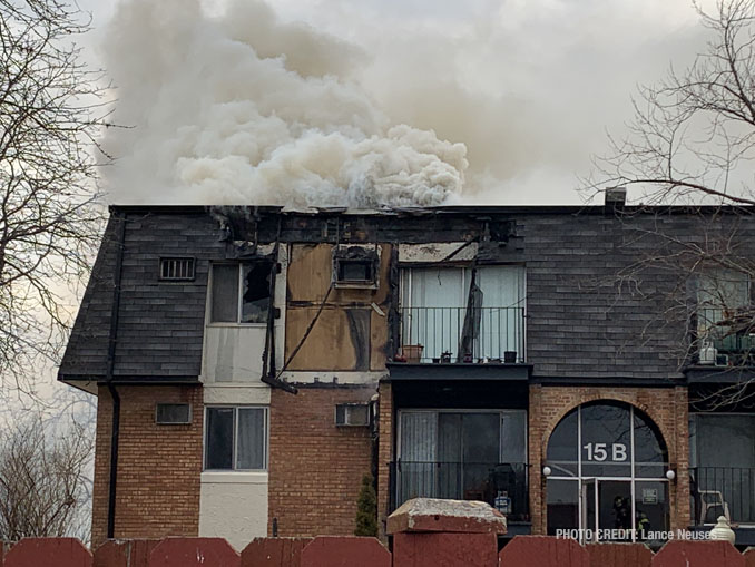 Smoke pushing out at 15 B Dundee Quarter in Palatine (PHOTO CREDIT: Lance Neuses)