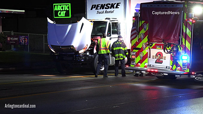 White Penske box truck at scene where pedestrian was hit and killed on Rand Road between Dryden Avenue and Thomas Street